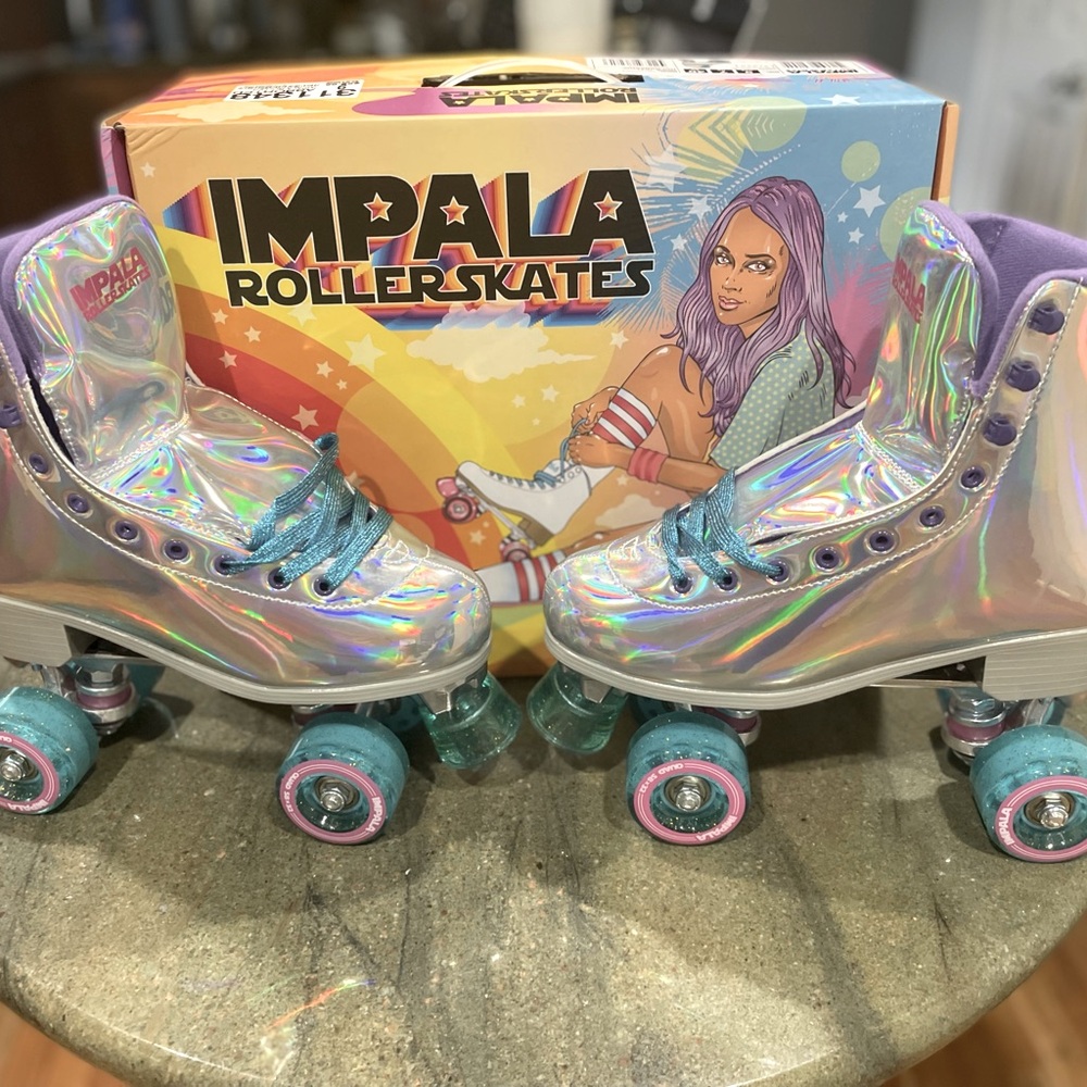 Beautiful New Size 9M Silver Impala Roller skates with purple wheels!!